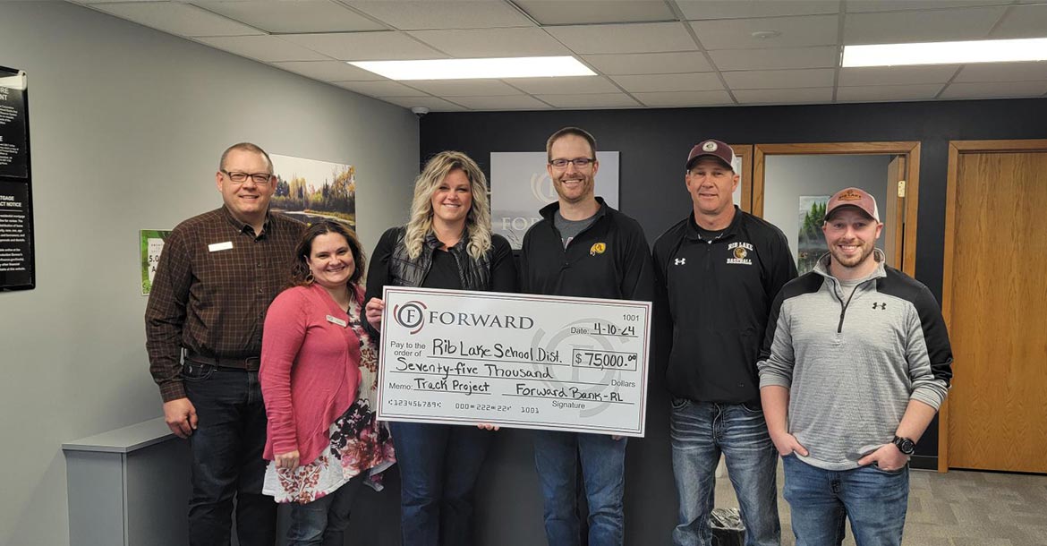 Forward Presents $75K Donation to Rib Lake School District for Track Improvement Project