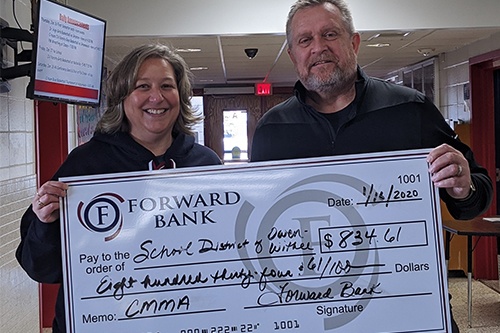 Forward Bank presents School District of Owen-Withee with donation for their participation in the Charitable Money Market Account program.