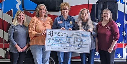 Forward presents Owen-Withee Ambulance with $10,000 donation