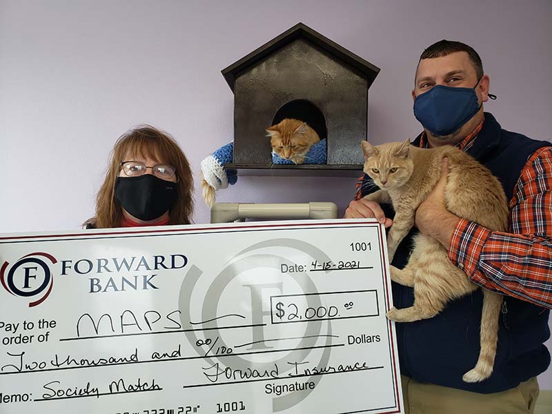 Forward Insurance presents donation to Marshfield Area Pet Shelter
