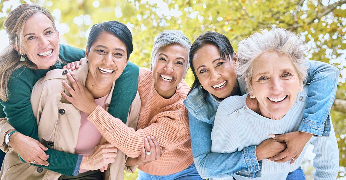 group of retired women laughing