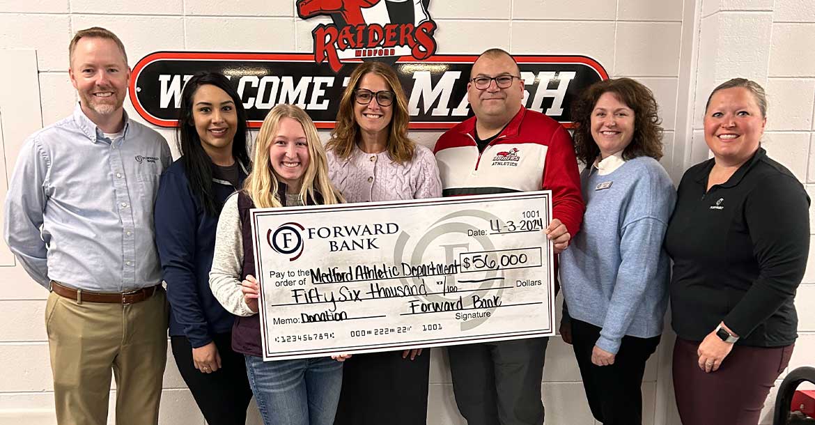Forward presents Medford School with $56,000 donation for gym updates