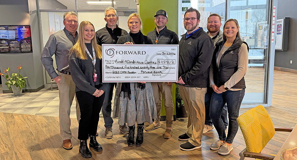 Forward's CMMA program presents Marshfield Ronald McDonald House a check