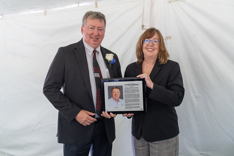 Bill Sennholz & Rose Oswald Poels with WBA Leaders in Banking Excellence plaque
